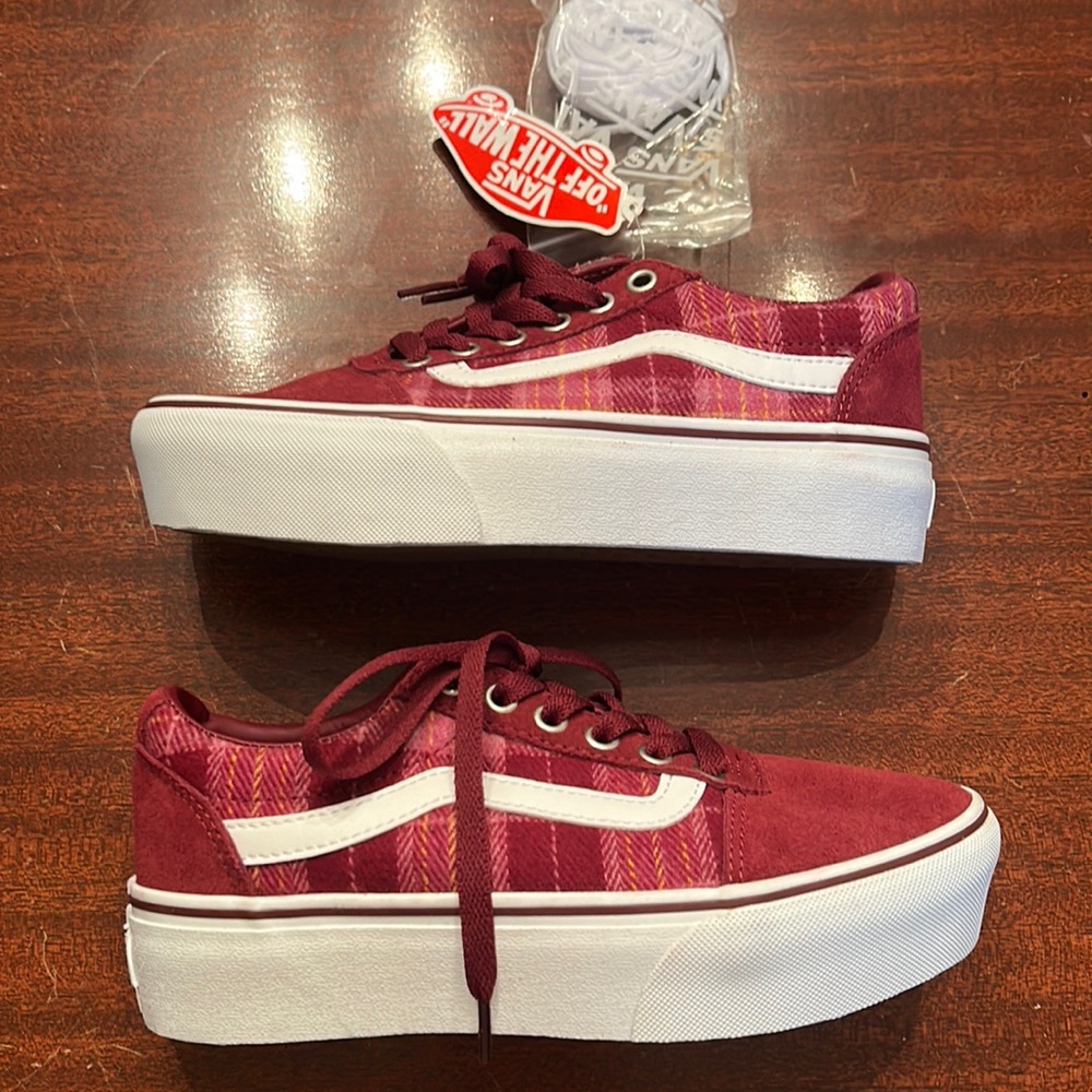 Vans Kids Sneakers in Wine and White. Gently used. More of a women’s size 6.